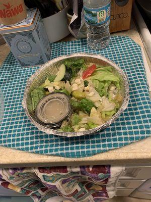 Greek salad. The dressing came on the side--I just put the container in it for the photo.