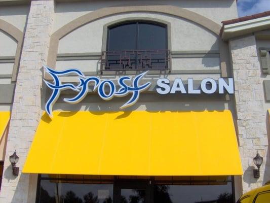 Professional hair care under the yellow awnings!