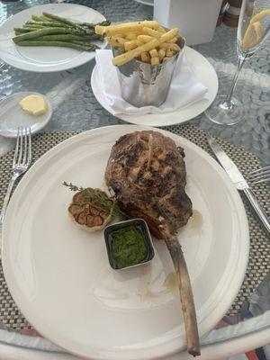 Veal Chop, Grilled Asparagus and Truffle French Fries