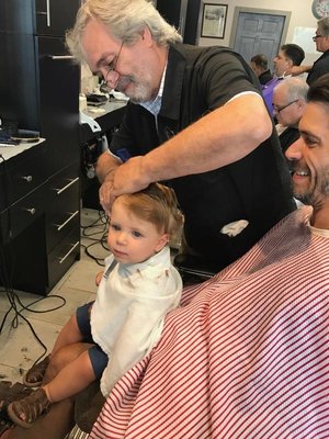 My little man getting his 1st haircut, a fine job by Enzo!