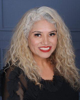 Christina Roman certified property manager/REALTOR