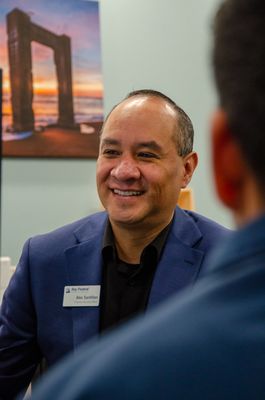 Financial Services Officer overjoyed and assisting a member