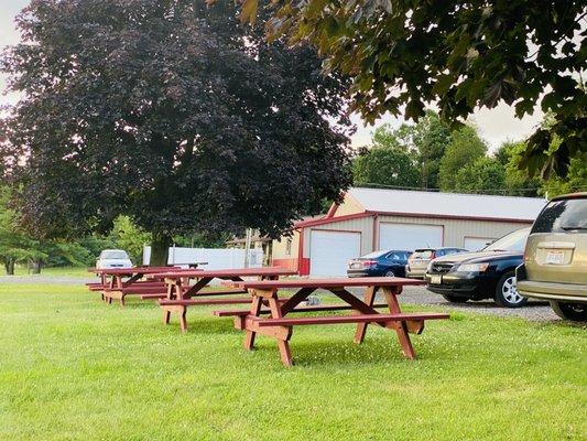 Picnic Tables outside across parking lot