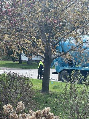 The concrete company washing their truck into the road after I came outside and they swung the chute off my property.