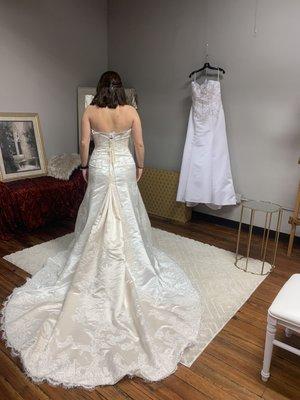 She's beautiful looking for her wedding dress