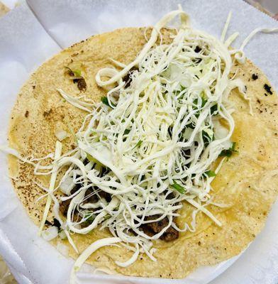 Oaxacan Taco with Quesillo (Oaxacan cheese) in a hand made tortilla!!