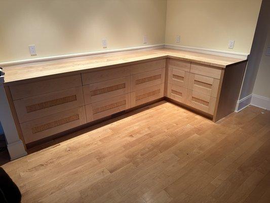 Our new pantry/storage cabinets. There used to be a bookcase, desk and tall cabinets here.