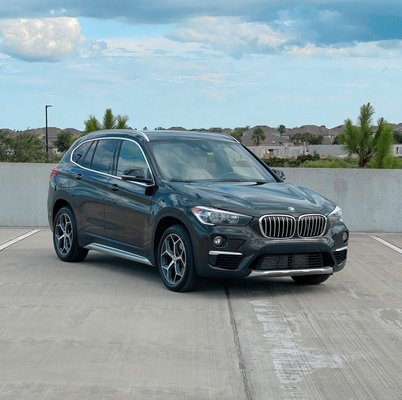 Our 2019 BMW X1 in Black is an amazing luxury car that provides both comfort and style to your next vacation!