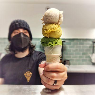 Matcha, golden spice, and lemon creme in a sugar cone.