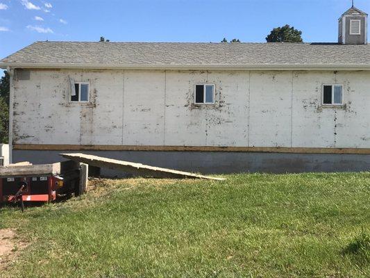 Custom siding installed on barn.