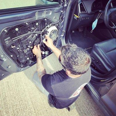 Repairing a window regulator. STOP PAYING DEALER PRICES! We can repair your power window today for much less than your dealership!