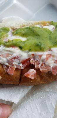 El Pelotero, wrapped bacon hotdog with cream cheese, avocado.