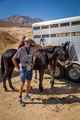 A plank owner, ultra running legend John Radich and a competing horse and mule.