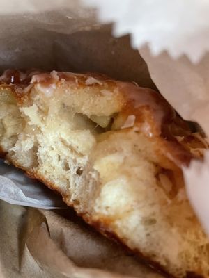 12/28/23. Unsuspecting apple fritter in plastic display case, $1.89. Surprisingly delicious.