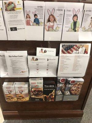 Flyers of Specials going around the mall and restaurant menus