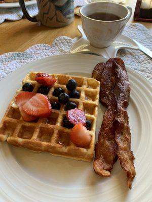 Belgian waffle with berries, side of bacon