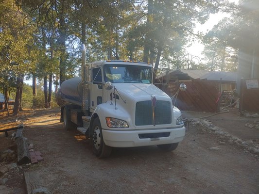 Filling a tank for a cabin up on Mount Lemmon.