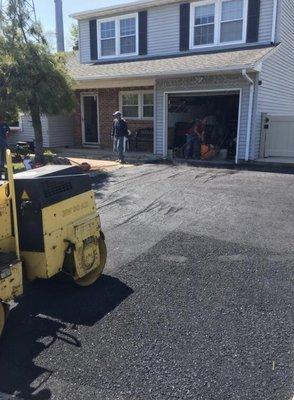 Asphalt getting compacted