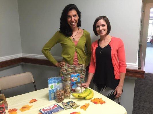 Lucy and Kristen sharing quick meal ideas with a community partner.