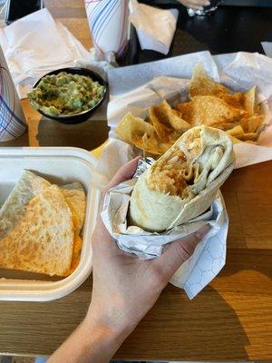 Butter chicken burrito, chips and guacamole, cheese quesadilla