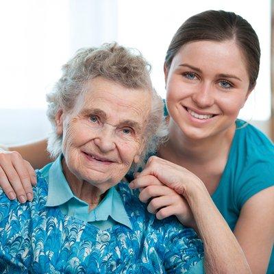 Female Caregiver With Elderly Woman