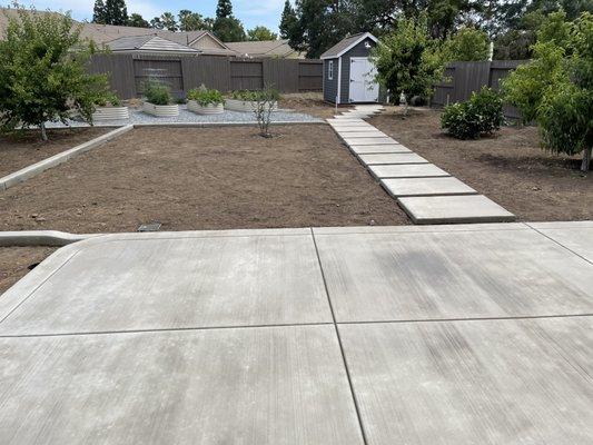 New patio, curbing, and pavers.