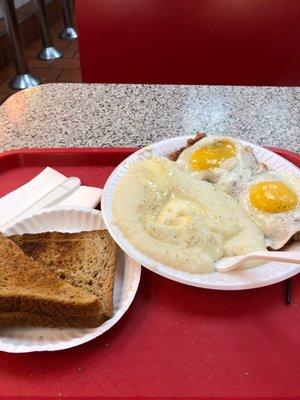 Grits eggs sunny side up wheat toast