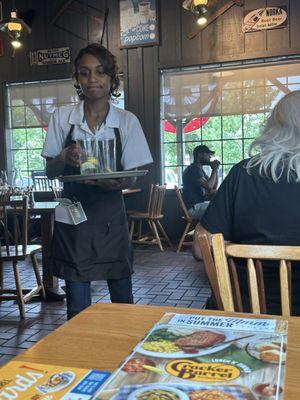 The waitress with poor customer service skills.