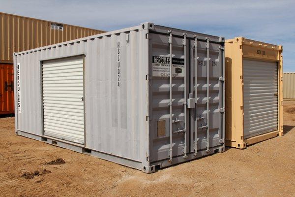 Modified storage containers with overhead doors