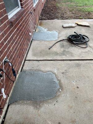 Back patio. Poor concrete work on the holes they dug