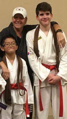 Two Students reaching closer to Black Belt.