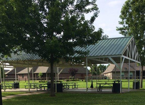 Restrooms are adjacent to this picnic shelter.