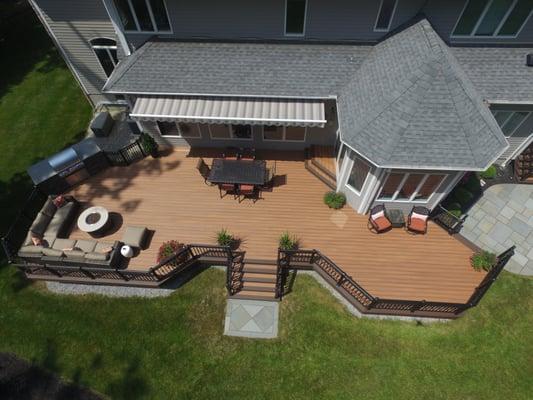 Trex decking and custom aluminum railing, built in Fire Magic grill and awning. Flemington, New Jersey