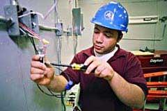 Marietta Electrician employee working on customers electric panel