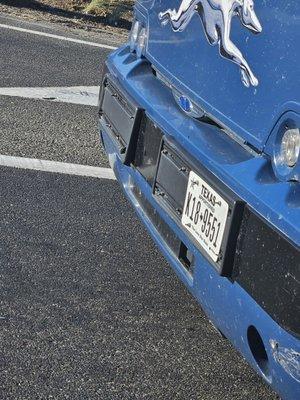 This is the license plate of the greyhound bus involved.