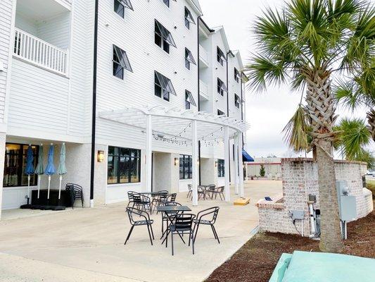 Patio area in front of the front door, Located right behind the Harrington Square sign