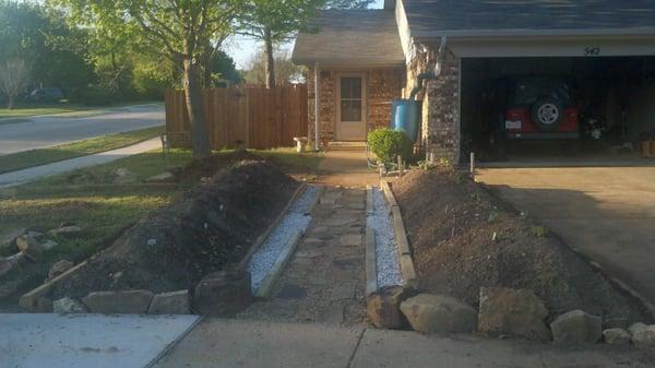 This is the simi completed first front yard garden.  Sides were eventually replaced with stone.