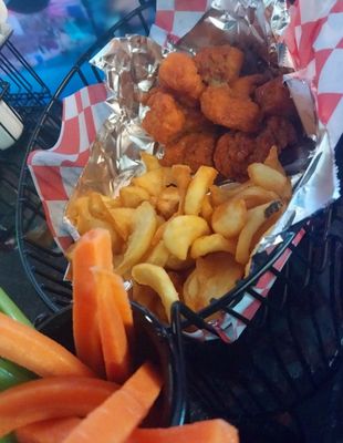 Boneless Chicken Wings with fries and celery and carrot sticks