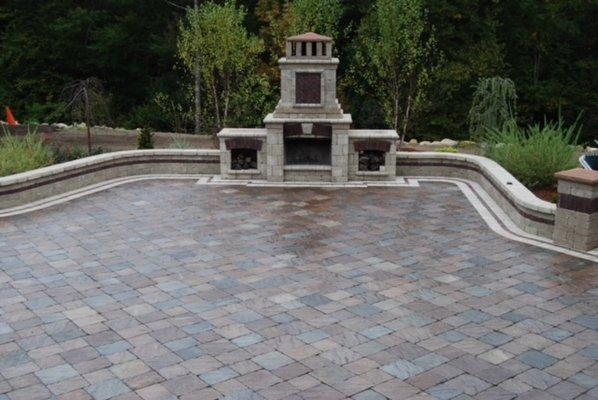 Outdoor fireplace and sealed paver patio