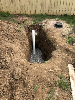 Part of trenchless system replacement with minimal yard disturbance even under addition