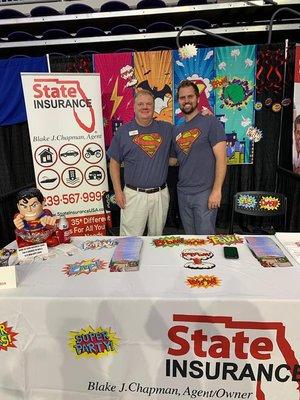 Tom and Blake our Super Heroes at the Royal Palm Coast Realtor's Association Trade Show