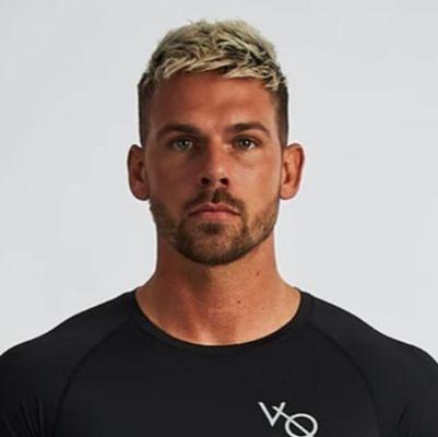 Men's haircut with bleach blonde tips.