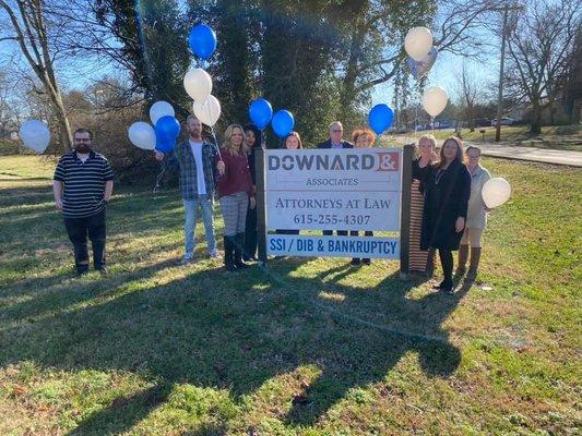 The team releasing balloons in honor of our founder, David Downard.