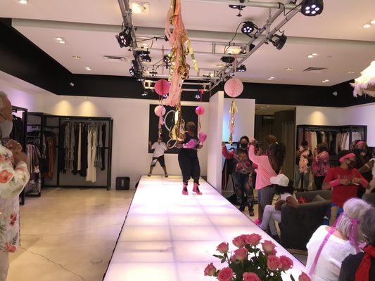 The Las Vegas Breast Cancer Awareness Caravan came by and lit up our runway with their love and positivity!