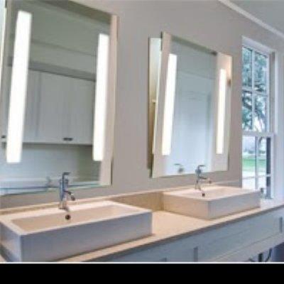 LED illuminated mirrors angled for the handicapped.