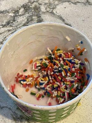 Sprinkle overload on a Froot loop sundae