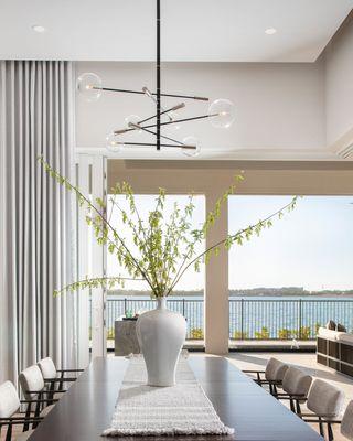 Pops of live green foliage give vitality and a Zen-like feeling to beiges and cool neutral grays.