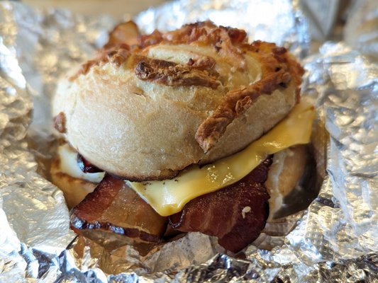 Cheese and bacon bagel with egg bacon and cheese...ao delicious