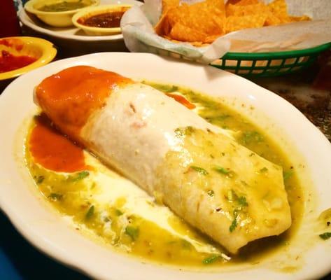 This burrito is representing the Mexican Flag with chicken, beef tips & pork on the inside.