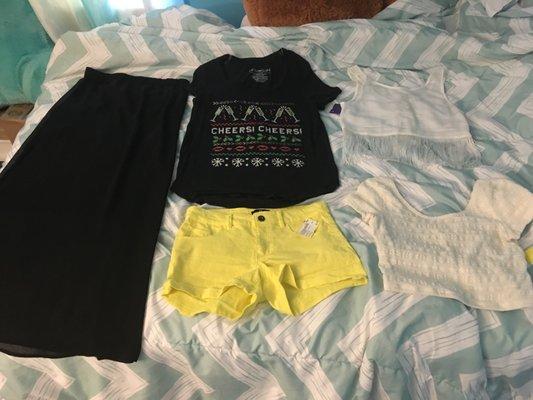 All this for less than $35! Brandsinclude: Express ($8 skirt), H&M ($8 shorts, $6 fringe crop), Fifth Sun ($4 black tee), Aero ($6 crop top)